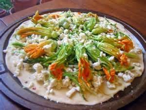 Squash Blossom and Pancetta Pizza 1 package active dry yeast Serves 4 1 tsp honey 3 Tbsps olive oil, divided 1 cup water (105-115 F) 2 cups shredded pepper jack cheese 3 cups whole wheat flour 4 oz