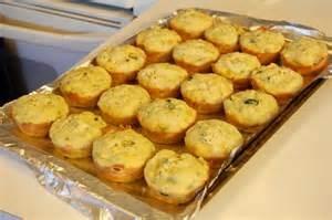 Yellow Squash Muffins (Makes 18-24 muffins) 2 lbs yellow squash (about 8 medium or 5 large) 2 eggs, beaten 1 cup melted butter 1 cup sugar 3 cups all purpose flour 1 Tbsp and 2 tsps baking powder