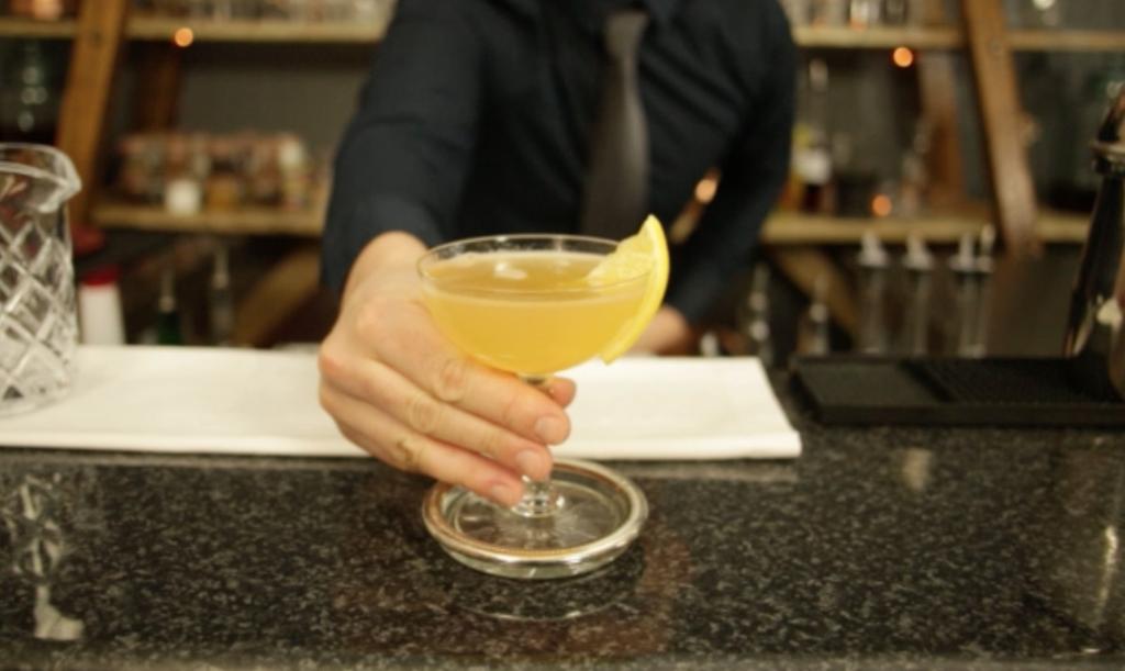 THE SIDECAR Fill a coupe glass with ice to chill it. Add two measures of brandy to a shaker tin. Add one measure of freshly squeezed lemon juice. Add one measure of triple sec.