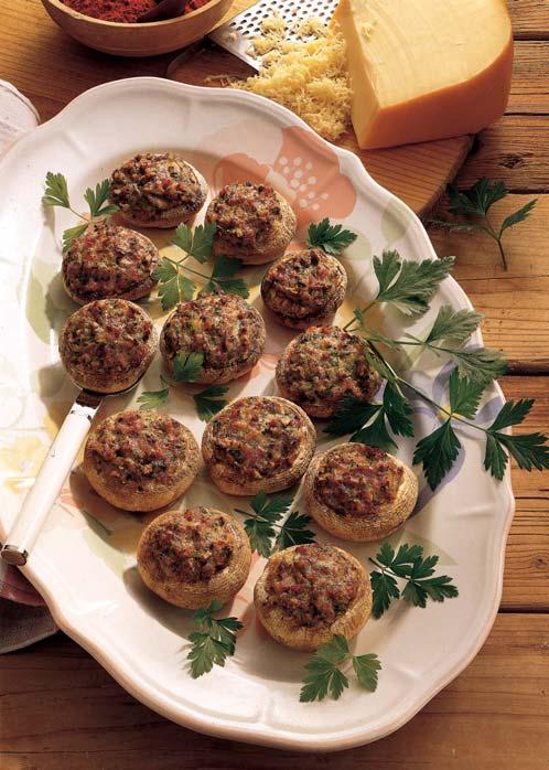 108 00016 GB 17-06-2004 14:46 Pagina 63 Stuffed Mushrooms 12 fresh mushrooms (if using button mushrooms select the largest ones) 50 g of cooked ham 50 g of grated cheese (e.g. Emmenthal) 1 egg 1 bunch of parsley salt, pepper combination Microwave + grill 10 min.