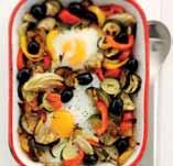 Roast in the oven for about 20 minutes until the vegetables are just tender. 4. Mix in the black olives. Make two wells in the middle of the vegetables. Crack an egg into each indentation.