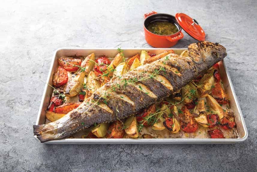 Drain well and arrange them in narrow strips on the base of a large roasting dish, large enough to hold the sea bass, either lengthways or diagonally. 3.