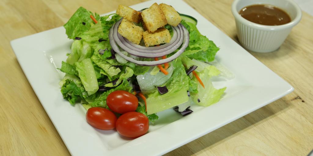 Side Salad 2 oz. prepared salad mix* 3 slices cucumber, cut ¹ ₈ thick 3 grape tomatoes 1 slice red onion, cut ¹ ₈ thick 6 croutons 1 ¹ ₂ fl. oz. Guest s preferred dressing *Forgotten how to make these?