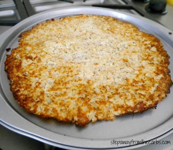 CAULIFLOWER PIZZA CRUST Serves 2 1 lb finely chopped cauliflower 1 egg white 1 cup shredded cheese ¼ cup flaxseed meal 1 tsp onion powder ½ tsp dried oregano salt and black pepper Cook the