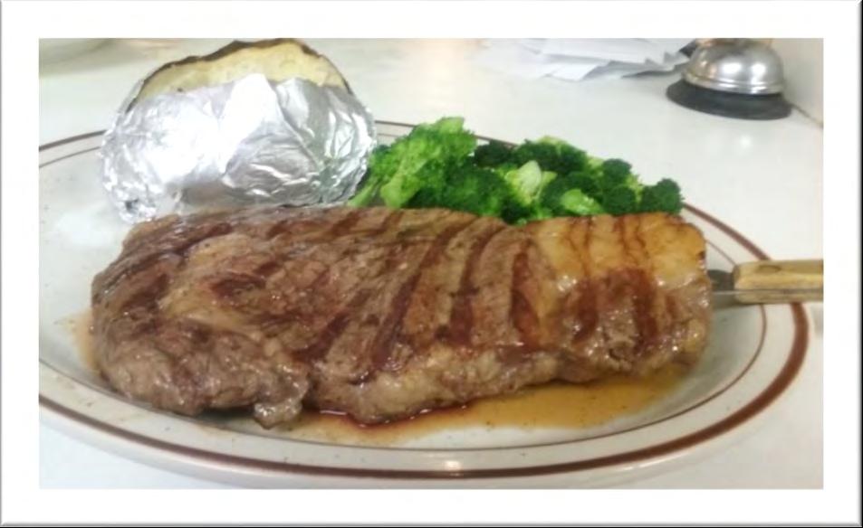 Steak Entrees New York Strip Choice 8oz steak grilled to order.