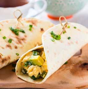 egg and avocado brekky wrap PREPARATION TIME: 0 MINUTES COOKING TIME: 5 MINUTES 0 eggs 500g tomatoes 200g cucumber 0 tortilla wraps 200g sliced low fat cheese 2 avocados ½ bunch coriander ½ tsp black