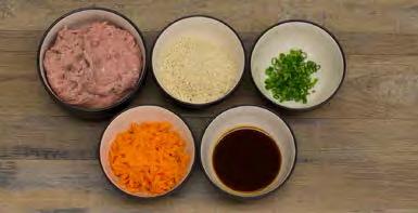 Combine ground turkey, shredded carrot, scallion, 3 tablespoons Teriyaki Sauce, and panko bread crumbs.