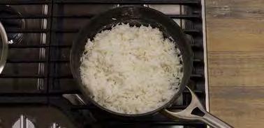 3 Once rice is cooked, heat Organic Coconut Oil in a 12-inch nonstick skillet
