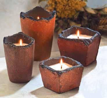 Medium Round Brown Terra Vasa These handcrafted jagged edge pots are made of terra cotta and will show some imperfections.