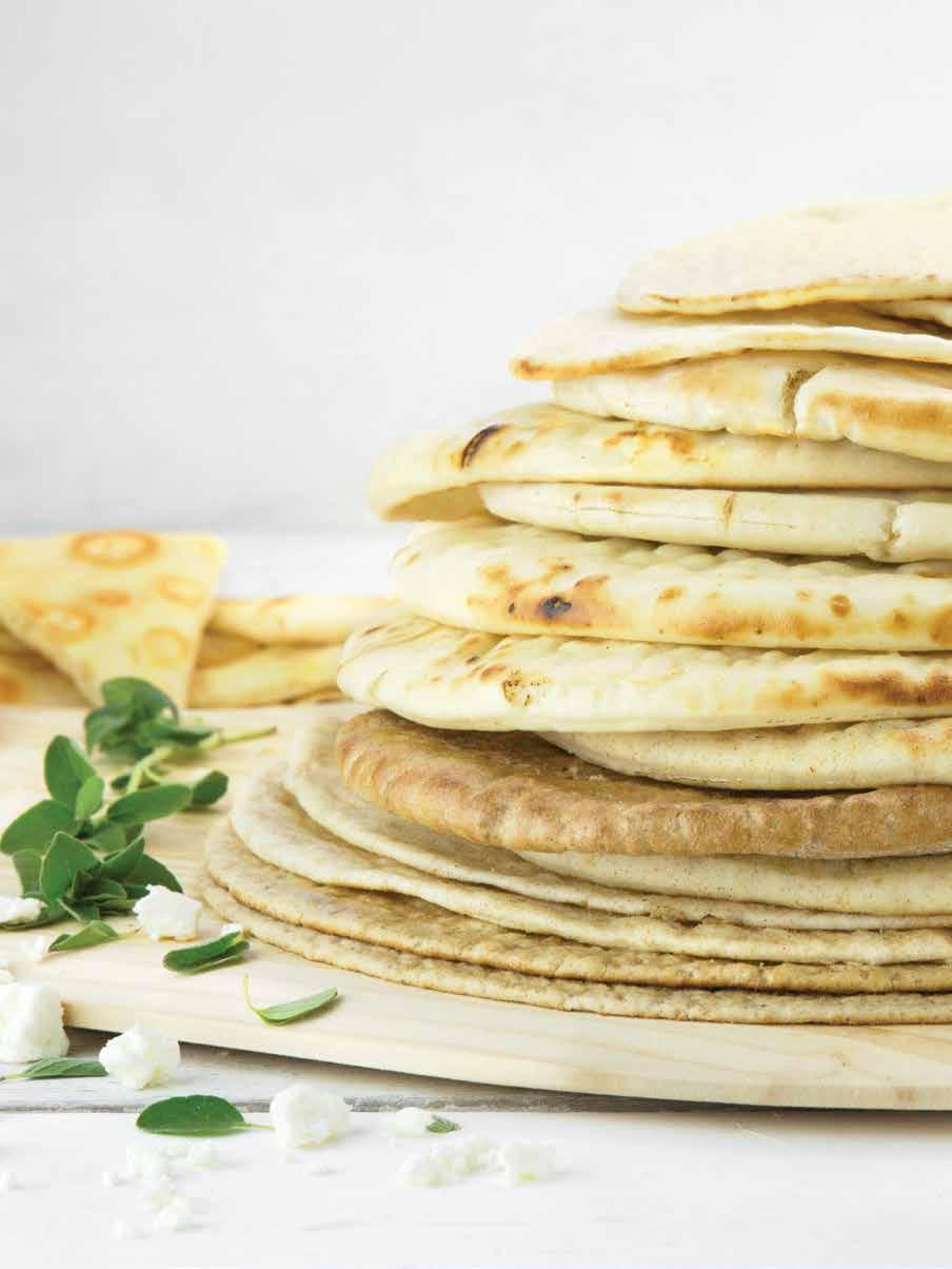 Pita Breads The traditional carrier for a Gyro sandwich, this soft flatbread can be traced to Ancient Greece (as well as the Near East and Mesopotamia) and remains a favorite in