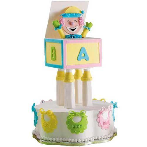 Everyone loves a Jack In The Box!! This adorable baby shower cake is made with fondant covered plastic dowels to give your guest a floating box illusion!