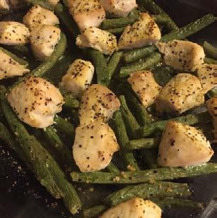 Cut chicken into smaller chunks. Arrange chicken on top of the green beans in the baking dish. Sprinkle lemon pepper seasoning over everything in the dish, to taste.