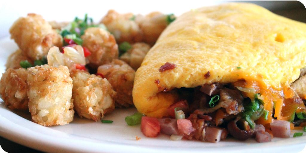 50 more* Hawaiian Omelette (Local Style) Our kalua pork, diced tomatoes, white & green onions, and lu au leaves - truly onolicious!