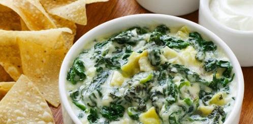 APPETIZERS Aristotle s Artichoke Dip Total Time: 25 Minutes Serves: 8-10 14 oz can artichoke hearts or bottoms drained and chopped into dip-sized pieces 8 oz cream cheese, softened 1 cup freshly
