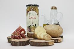 Cooked Potatoes with Spanish Ham Ingredients: Potatoes (70%), Iberian Ham (20%), Extra Virgin
