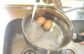 1 Add eggs to saucepan.
