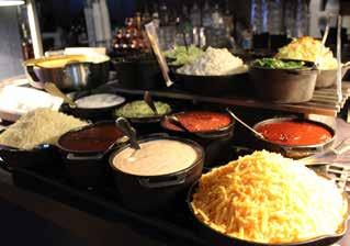 EVENT FOOD STATIONS AVAILABLE FOR GROUPS OF 25 OR MORE; STATIONED FOR 90 MINUTES NACHO BAR Includes: corn tortilla chips with nacho cheese served warm on an induction burner shredded lettuce,