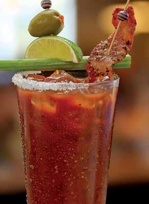 BUSTER S BLOODY MARY Tito s Handmade Vodka, house-made zesty mix and candied brown sugar peppercorn bacon. 223 cals.