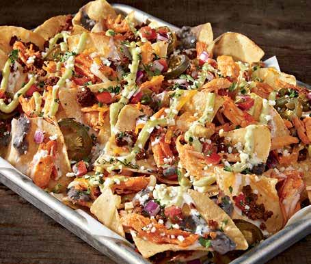 Cantina nachos YOUR CHOICE OF BUFFALO CHICKEN OR GREEN CHILE SHAVED RIBEYE With spicy chorizo sausage, jalapeño white queso, shredded cheeses, house-made black beans, pickled jalapeños, fresh pico de