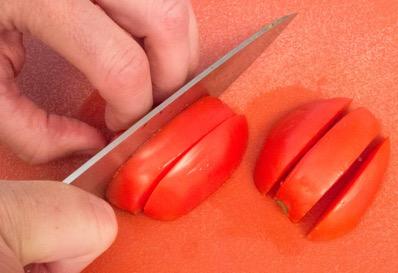 prepare the tomatoes by first giving them a
