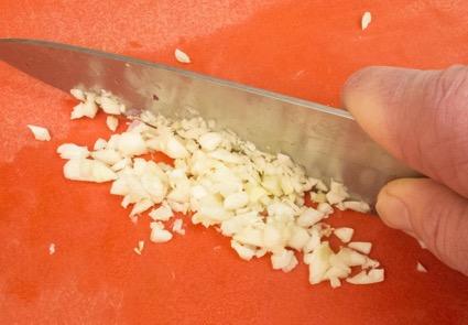 then chop the garlic slices into