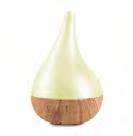 Aroma-Bloom Cream Pearl Lid Wood-look base The Aroma-Bloom will instantly purify, cleanse and refresh the atmosphere and create more negative ions to improve general wellbeing.