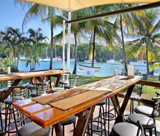 THE VENUE Situated on the Port Douglas Marina, just off Wharf Street, is one of Port Douglas' best kept secrets: The Port Douglas Yacht Club.