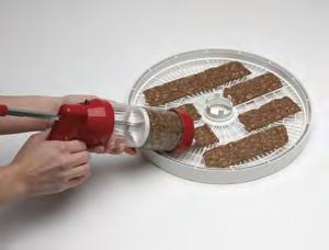 Add one package each of jerky seasoning mix and cure per pound of ground meat. Mix well and form into strips by using our Jerky Works TM Kit or a cookie press. Place on trays and dry.