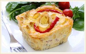 Ham Corn &Capsicum Frittata A generous portion of savoury, gluten free frittata enriched with eggs, ham and corn.