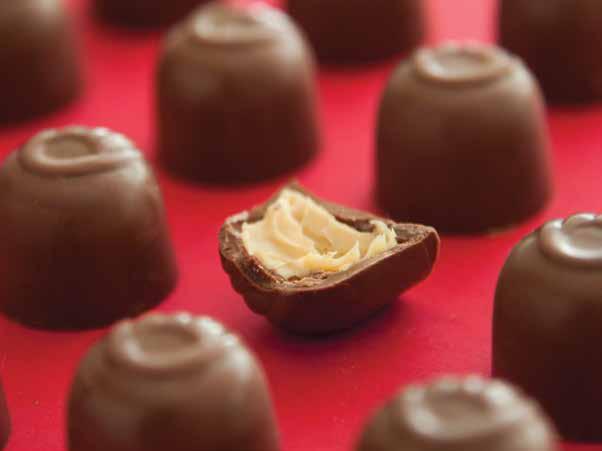 Eggnog Truffles Pair a glass of eggnog with these eggnog-inspired truffles, featuring a wowing white chocolate and rum filling inside a milk