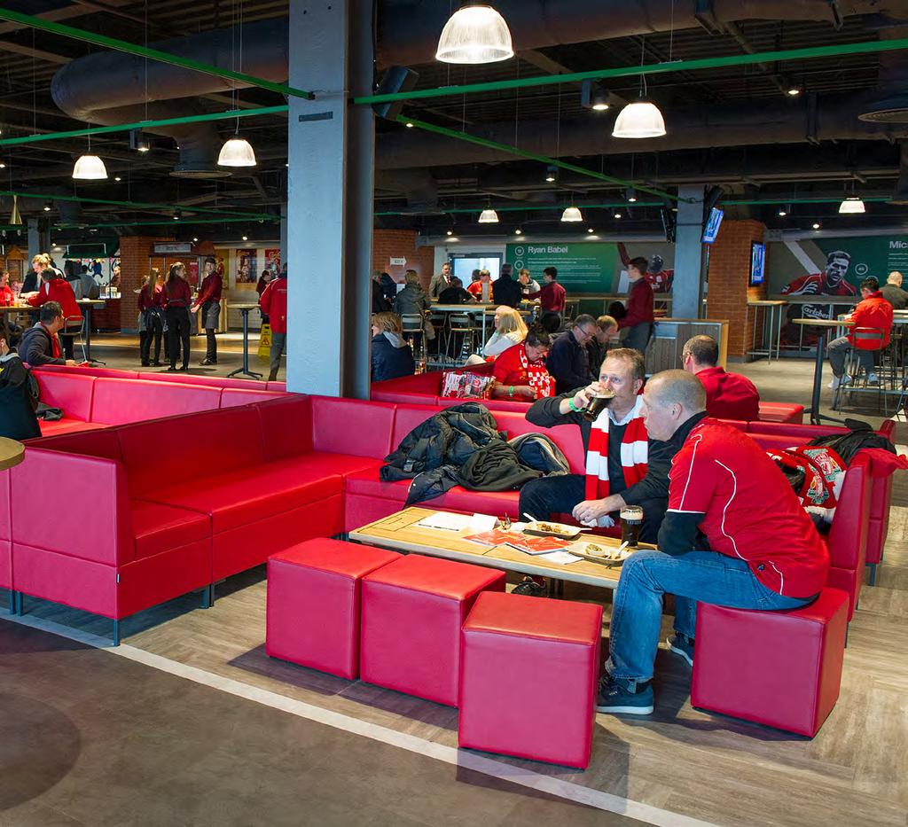 CARLSBERG DUGOUT A bright and social sports bar concourse, The Carlsberg Dugout celebrates Liverpool FC's creativity on the pitch, whisking fans from the terraces to the side-lines for some of our