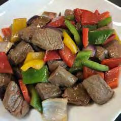 In a bowl add the marinade ingredients and beef pieces. Leave for 10 minutes. 2. Heat 2 teaspoons of vegetable oil in the icook Wok. Add beef and stir-fry until golden brown.