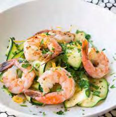 ZESTY PRAWNS WITH ZUCCHINI Serves four 1 teaspoon peanut or vegetable oil 500g zucchini, cut into small strips 1 medium tomato, seeded and chopped 1 small green capsicum, chopped into pieces 1 brown