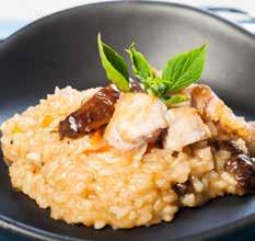 CHICKEN & SHIITAKE RISOTTO Serves four 2 shallots, finely chopped 2 tablespoons olive oil 250g risotto rice 150ml white wine 750ml vegetable stock 250g shiitake mushrooms, finely chopped 350g chicken