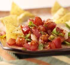 TOMATO SALSA Serves eight 3 tomatoes, finely chopped ½ brown onion, finely chopped 1 teaspoon olive oil 2-3 mild green chillies, finely chopped 1 teaspoon chilli