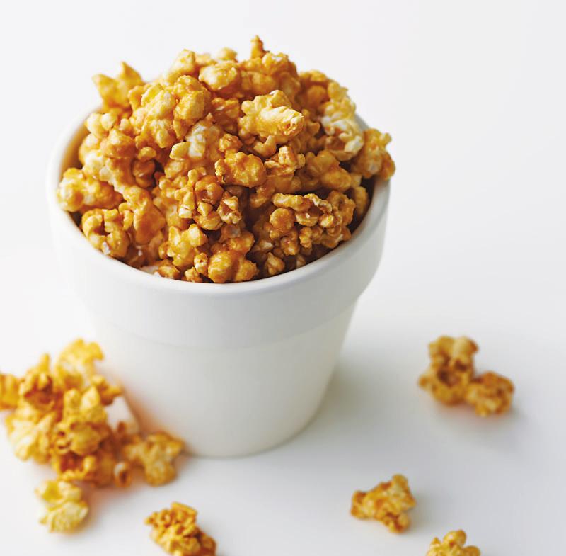 Serves 10 Serving size: 1 cup 15 COOK: 5 10 Classic Caramel CORN 2 bags microwave popcorn 1 stick unsalted butter 1 cup light brown sugar ¼ cup light corn syrup 1 tsp.