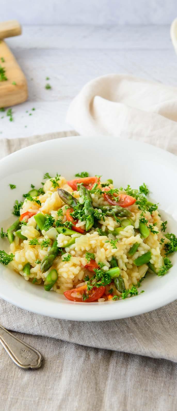 ASPARAGUS & TOMATO RISOTTO Ingredients (Makes 4 serves) l 2 tbsp extra virgin olive oil l 1 brown onion, diced l 2 garlic cloves, finely diced l 1 1/3 cup arborio rice (uncooked) l 1 litre