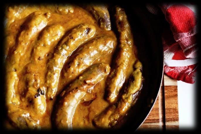 Quick And Creamy Curried Sausages 15 minutes 20 minutes 6-10 8-10 sausages - beef or chicken work best 1 onion, peeled and cut in half 1-2 tsp curry powder 1 tblsp thermomade veggie stock 50g plain