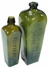 An early bottle from Lucas Brothers in Sydney. F. Drioli, Zara, Double Headed Eagle TM. Teal. 220 mm. These Zara seals held Maraschino Liqueur. P. F. Heering. Dark Red Amber.