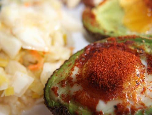 Avocado baked eggs 2 large avocados, halved lengthways 4 small eggs salt and