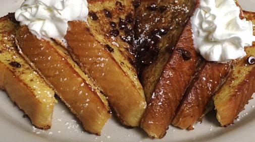 Pecan, Blueberry, or Cherry Pancakes Chocolate Chip Pancakes Pigs in a Blanket Sausage links rolled up into three delicious pancakes Silver Dollar Pancakes Twelve small fluffy pancakes House Waffles