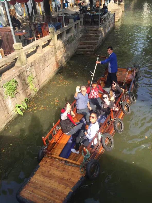 Tongli Water Town: Paddle Boat Ride Tongli, one of the most beautiful water canal towns with a 1,200 year old village built around a series of canals.