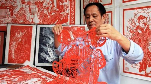 You will learn the basic techniques and motifs used when creating the intricate designs, which are often cut from red paper.