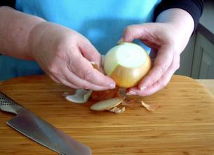 Figure 3 How to cut an onion in half 5. Peel off the outer layer of skin from the onion a.