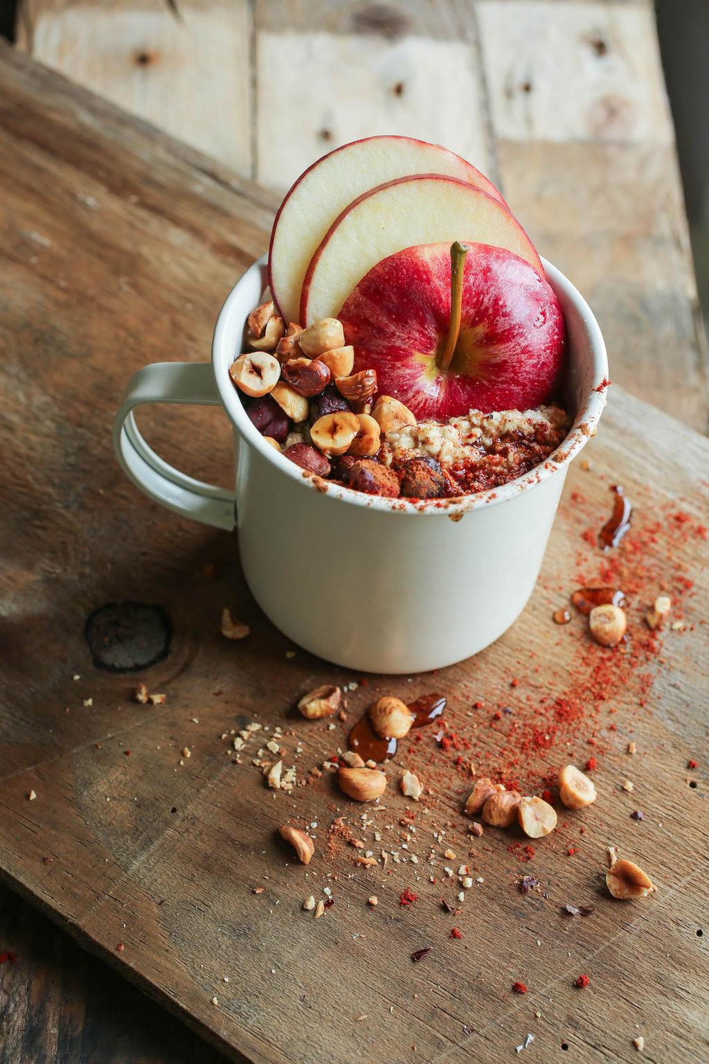 apple maple porridge with hazelnuts cinnamon and chilli Need a warm spicy kick in the morning? Just add roasted hazelnuts for a crunch and dried chilli for a bit of heat.