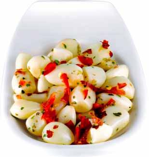Aglio Marinato Marinated Sweet Garlic cloves Sweet and luscious, these cloves of marinated garlic can be eaten and enjoyed by everyone.