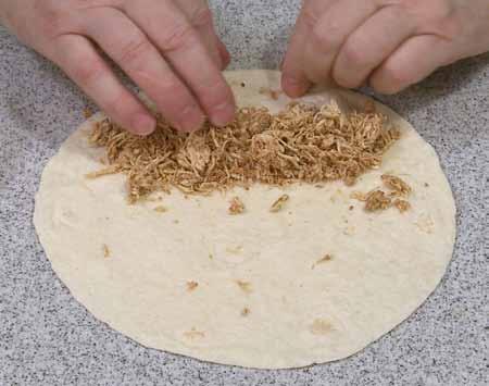 5 4 To roll a flauta, place a couple tablespoons of filling close to one edge of