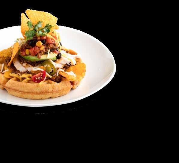SAVORY WAFFLES Tex Mex Waffle Tex Mex 65 Warm waffle served with beef ragu, grilled chicken, guacamole, beans and corn salsa.