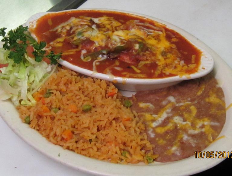 Especialidades Served with tortillas, rice and choice of refried or black beans Steak Picado Chopped top sirloin with onions, tomatoes, and bell peppers, smothered in red sauce...14.