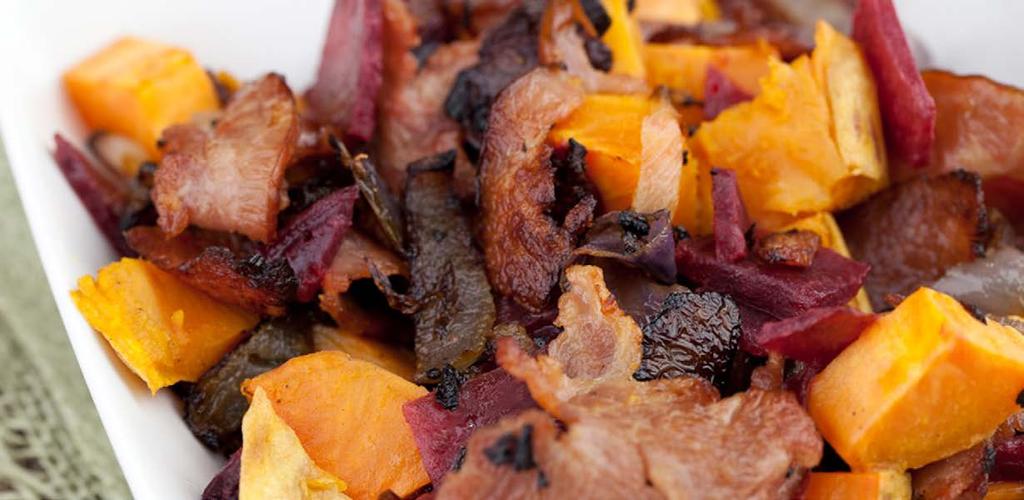 Sweet potato-beet hash Total Time: 45 minutes Serves: -4 large sweet potato, peeled and cubed large beet, peeled and cubed tablespoon coconut oil, melted Sea salt and pepper slice turkey bacon onion,